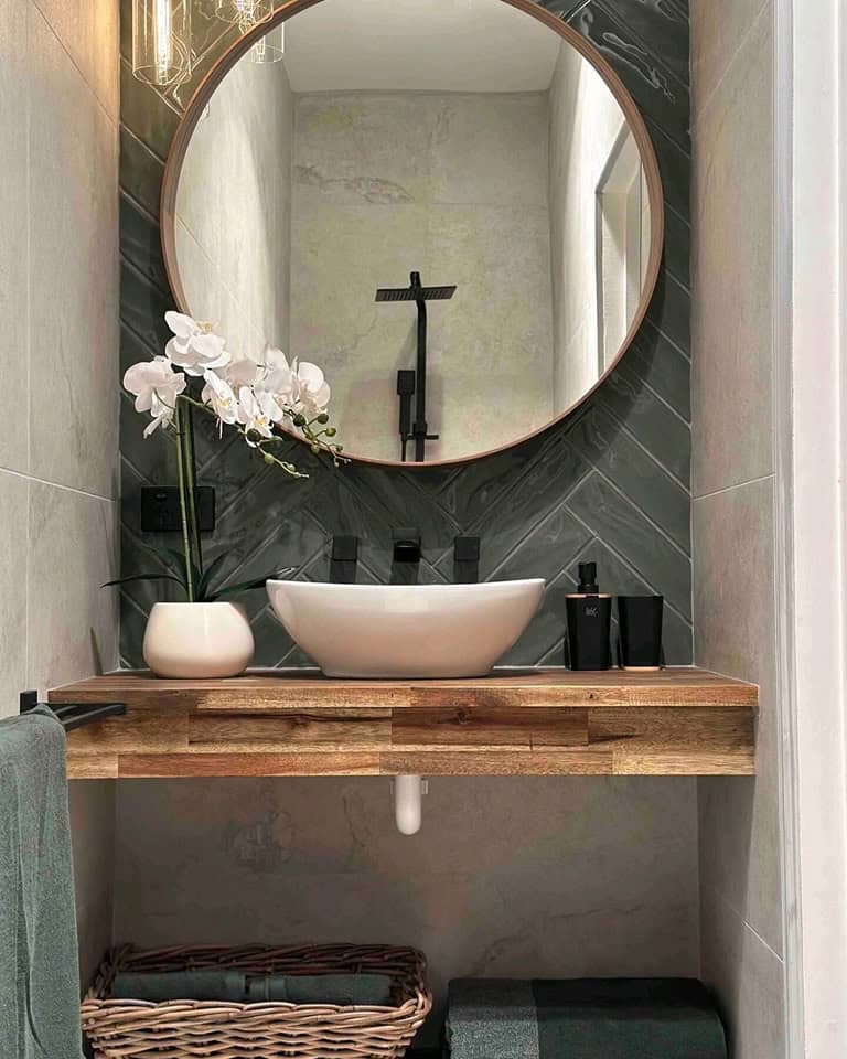 bathroom renovation, powder room with green decorative wall tiling and black accents bentleigh